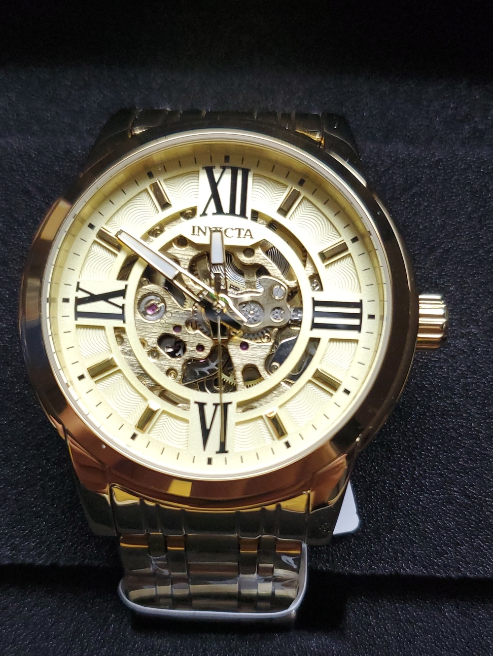Invicta Men’s Gold Automatic Skeleton Dial Watch with Black Roman Markers